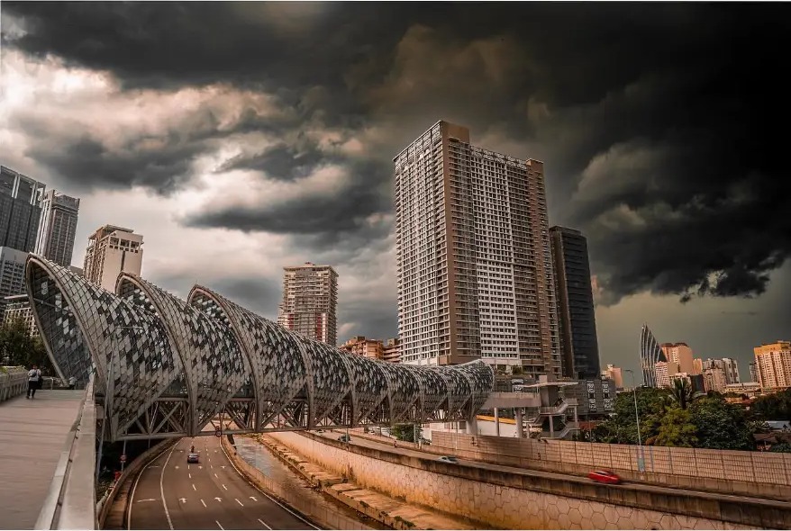 The Saloma Link bridge under heavy storm clouds
